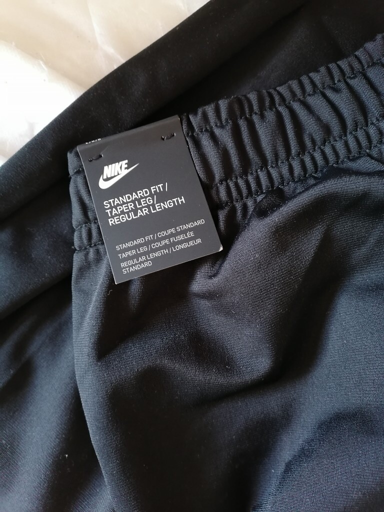 standard fit tapered leg regular length nike